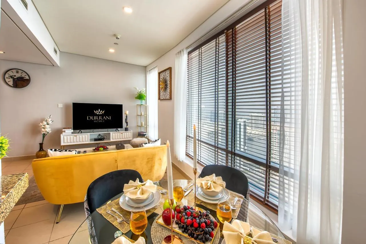 Durrani Homes - Iconic Burj Views Living Dubai