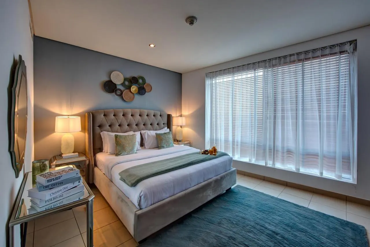 Durrani Homes - Iconic Burj Views Living Dubai